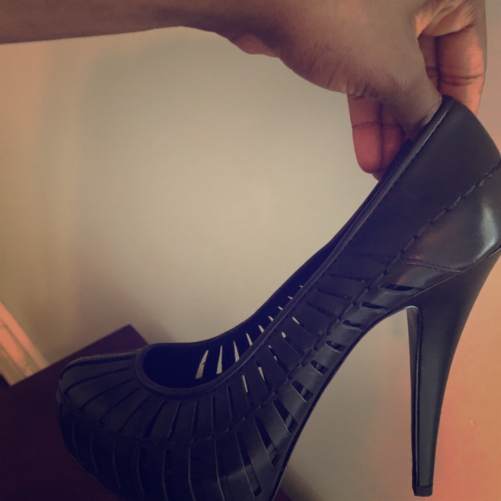 Black platform heels in good condition.